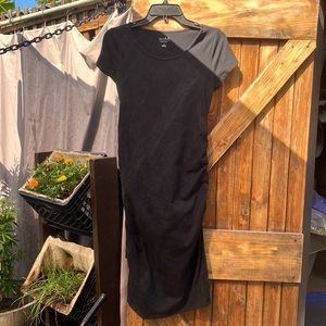 Black fitted maternity dress room for your tummy. Short sleeve/stretch material